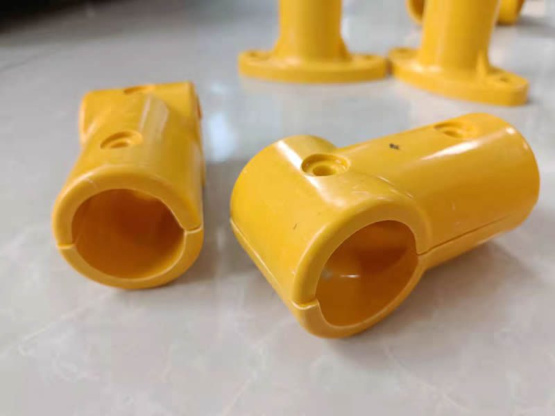 A 3-way 90 degree FRP handrail fitting