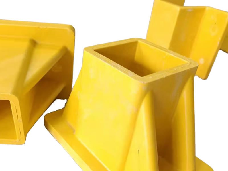 A square base handrail fitting